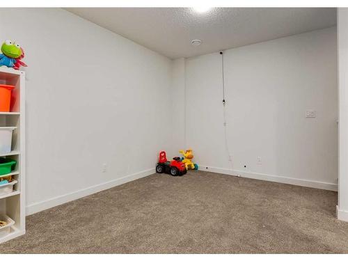 92 Carringvue Way Nw, Calgary, AB - Indoor Photo Showing Other Room