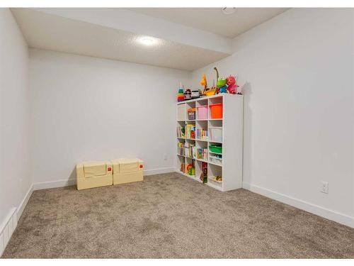 92 Carringvue Way Nw, Calgary, AB - Indoor Photo Showing Other Room