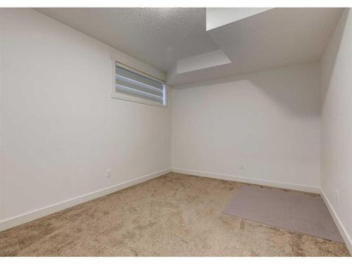 92 Carringvue Way Nw, Calgary, AB - Indoor Photo Showing Other Room