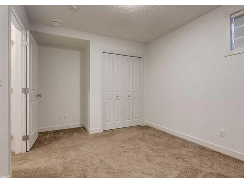 92 Carringvue Way Nw, Calgary, AB - Indoor Photo Showing Other Room