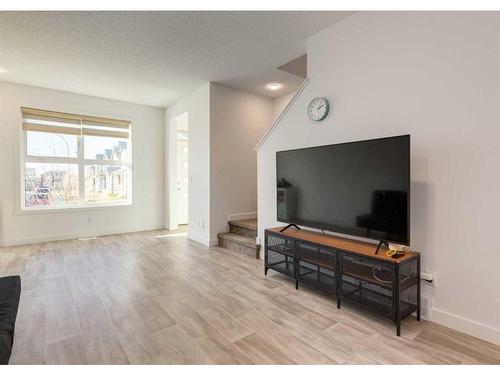 92 Carringvue Way Nw, Calgary, AB - Indoor Photo Showing Living Room