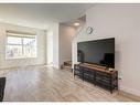 92 Carringvue Way Nw, Calgary, AB  - Indoor Photo Showing Living Room 