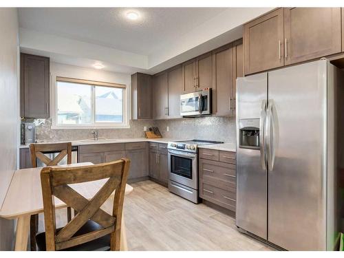 92 Carringvue Way Nw, Calgary, AB - Indoor Photo Showing Kitchen