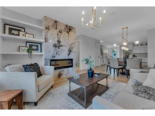 908 39 Street Sw, Calgary, AB - Indoor Photo Showing Living Room With Fireplace