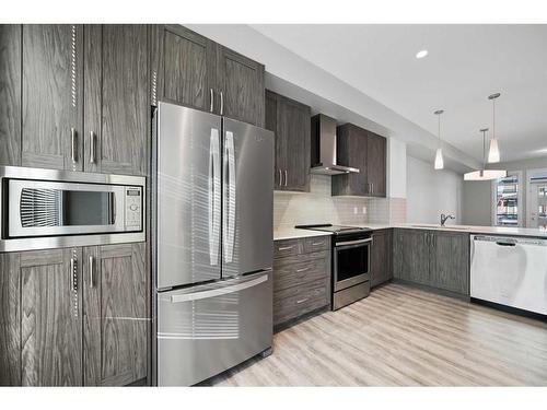 19623 42 Street Se, Calgary, AB - Indoor Photo Showing Kitchen With Upgraded Kitchen