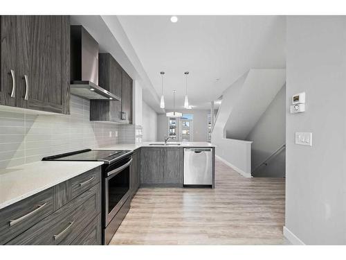 19623 42 Street Se, Calgary, AB - Indoor Photo Showing Kitchen With Upgraded Kitchen