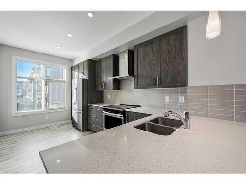 19623 42 Street Se, Calgary, AB - Indoor Photo Showing Kitchen With Double Sink With Upgraded Kitchen