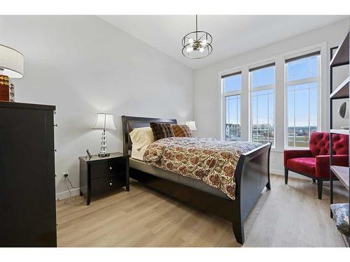 970 Harmony Parade, Rural Rocky View County, AB - Indoor Photo Showing Bedroom