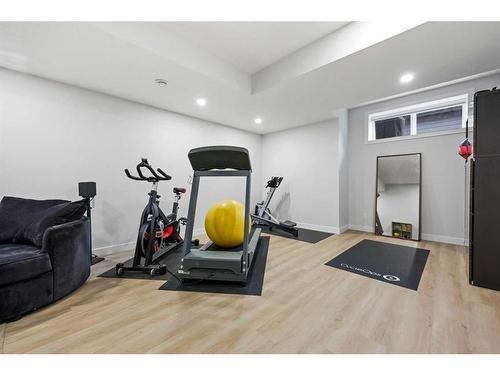 970 Harmony Parade, Rural Rocky View County, AB - Indoor Photo Showing Gym Room