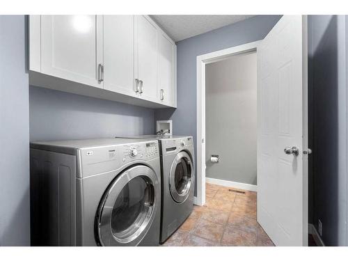 52 Shawbrooke Manor Sw, Calgary, AB - Indoor Photo Showing Laundry Room