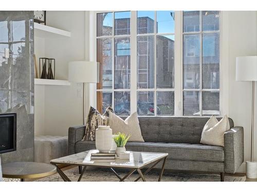 226 33 Avenue Ne, Calgary, AB - Indoor Photo Showing Living Room With Fireplace