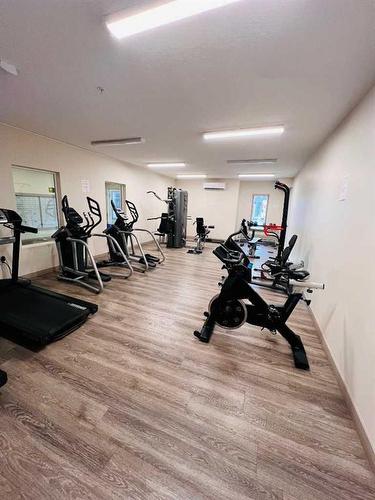 1416-4641 128 Avenue Ne, Calgary, AB - Indoor Photo Showing Gym Room