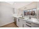 302-345 4 Avenue Ne, Calgary, AB  - Indoor Photo Showing Kitchen 