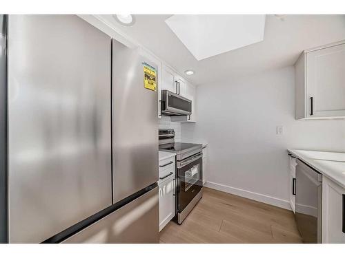 302-345 4 Avenue Ne, Calgary, AB - Indoor Photo Showing Kitchen With Stainless Steel Kitchen