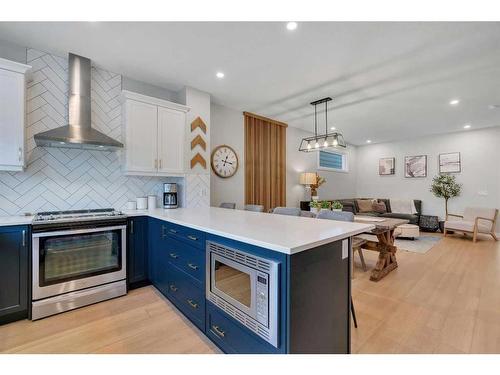 74 Magnolia Square Se, Calgary, AB - Indoor Photo Showing Kitchen With Stainless Steel Kitchen With Upgraded Kitchen