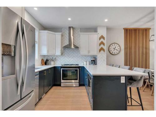 74 Magnolia Square Se, Calgary, AB - Indoor Photo Showing Kitchen With Stainless Steel Kitchen With Upgraded Kitchen