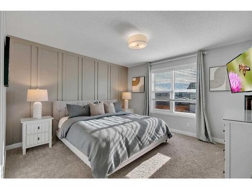 74 Magnolia Square Se, Calgary, AB - Indoor Photo Showing Bedroom