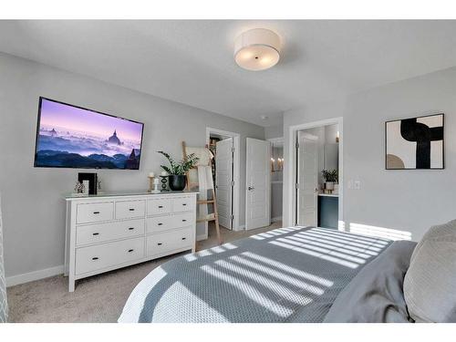 74 Magnolia Square Se, Calgary, AB - Indoor Photo Showing Bedroom