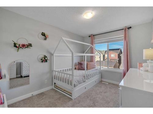 74 Magnolia Square Se, Calgary, AB - Indoor Photo Showing Bedroom