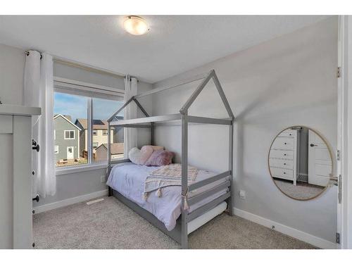 74 Magnolia Square Se, Calgary, AB - Indoor Photo Showing Bedroom