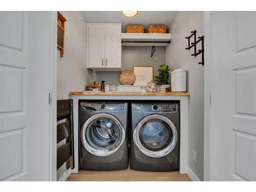 74 Magnolia Square Se, Calgary, AB - Indoor Photo Showing Laundry Room