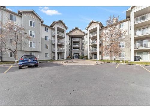 415-1000 Somervale Court Sw, Calgary, AB - Outdoor With Balcony With Facade