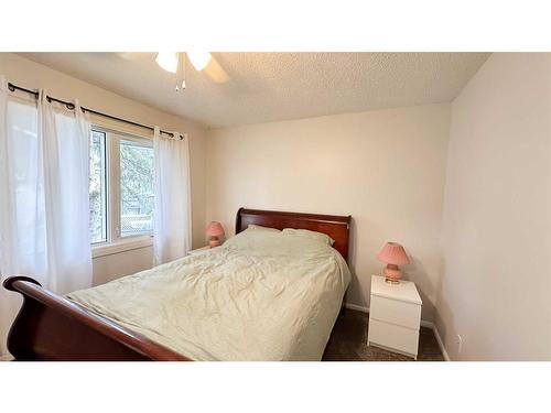 202 2Nd Ave Ne, Sundre, AB - Indoor Photo Showing Bedroom