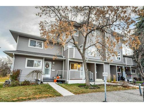 65-200 Shawnessy Drive Sw, Calgary, AB - Outdoor With Deck Patio Veranda With Facade