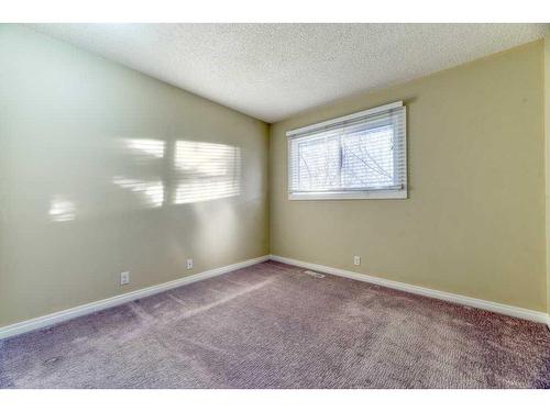 65-200 Shawnessy Drive Sw, Calgary, AB - Indoor Photo Showing Other Room