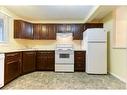 65-200 Shawnessy Drive Sw, Calgary, AB  - Indoor Photo Showing Kitchen 