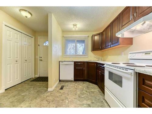 65-200 Shawnessy Drive Sw, Calgary, AB - Indoor Photo Showing Kitchen