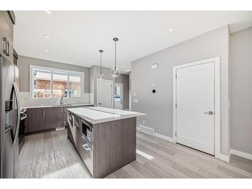 504 Chelsea Gardens, Chestermere, AB - Indoor Photo Showing Kitchen With Upgraded Kitchen