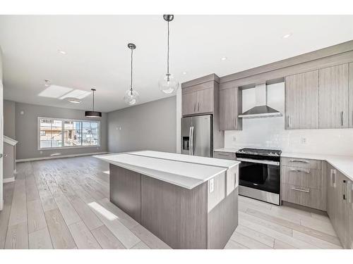 504 Chelsea Gardens, Chestermere, AB - Indoor Photo Showing Kitchen With Stainless Steel Kitchen With Upgraded Kitchen