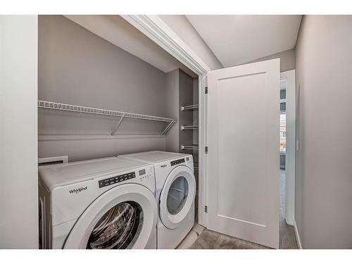 504 Chelsea Gardens, Chestermere, AB - Indoor Photo Showing Laundry Room