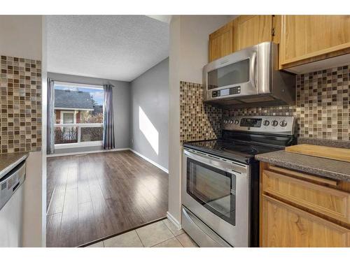 85-6915 Ranchview Drive Nw, Calgary, AB - Indoor Photo Showing Kitchen With Stainless Steel Kitchen