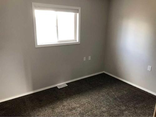 105 1 A Street, Linden, AB - Indoor Photo Showing Other Room