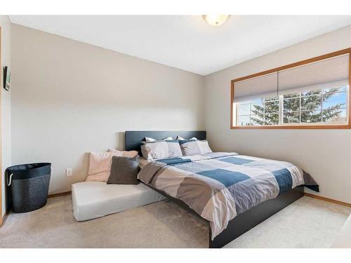 228 Quigley Close, Cochrane, AB - Indoor Photo Showing Bedroom