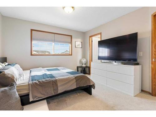 228 Quigley Close, Cochrane, AB - Indoor Photo Showing Bedroom