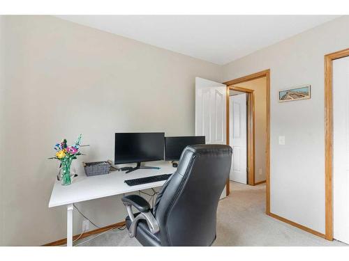 228 Quigley Close, Cochrane, AB - Indoor Photo Showing Office