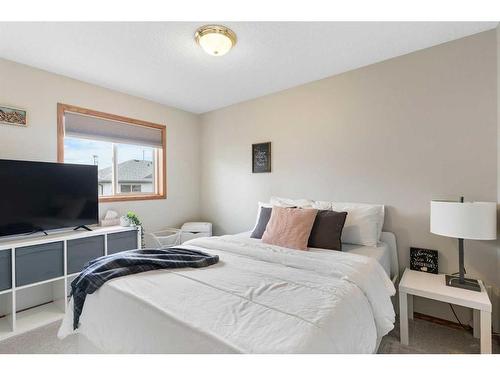 228 Quigley Close, Cochrane, AB - Indoor Photo Showing Bedroom