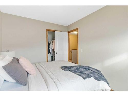 228 Quigley Close, Cochrane, AB - Indoor Photo Showing Bedroom