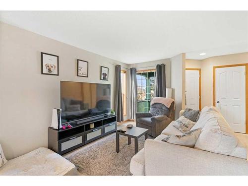 228 Quigley Close, Cochrane, AB - Indoor Photo Showing Living Room