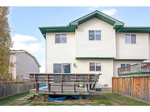 228 Quigley Close, Cochrane, AB - Outdoor With Exterior