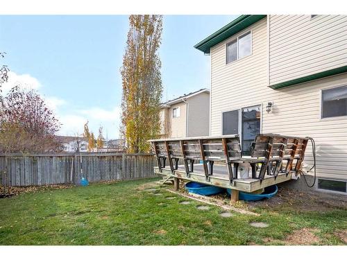 228 Quigley Close, Cochrane, AB - Outdoor With Deck Patio Veranda