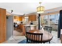 228 Quigley Close, Cochrane, AB  - Indoor Photo Showing Dining Room 