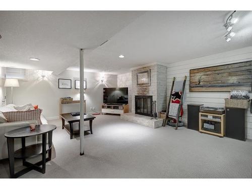 10632 Brackenridge Road Sw, Calgary, AB - Indoor With Fireplace