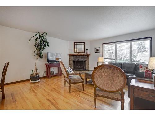 10632 Brackenridge Road Sw, Calgary, AB - Indoor With Fireplace