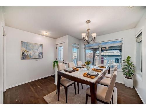 34 Sunset Heights, Cochrane, AB - Indoor Photo Showing Dining Room