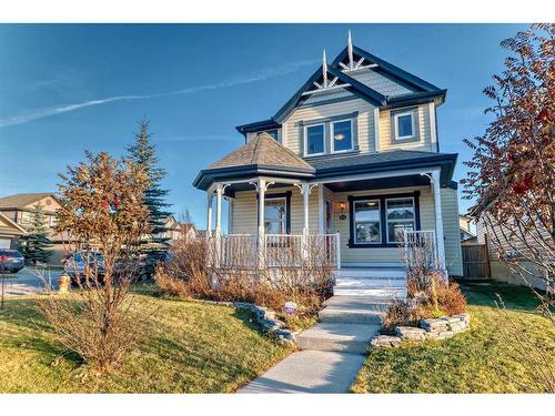 34 Sunset Heights, Cochrane, AB - Outdoor With Deck Patio Veranda With Facade