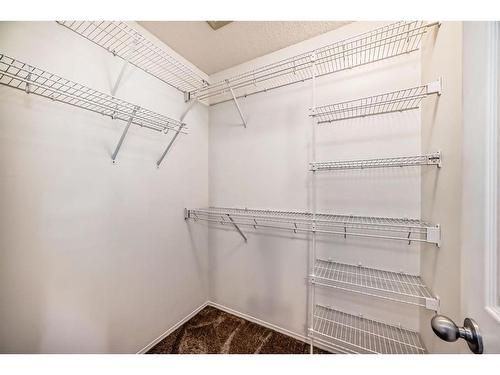 34 Sunset Heights, Cochrane, AB - Indoor With Storage